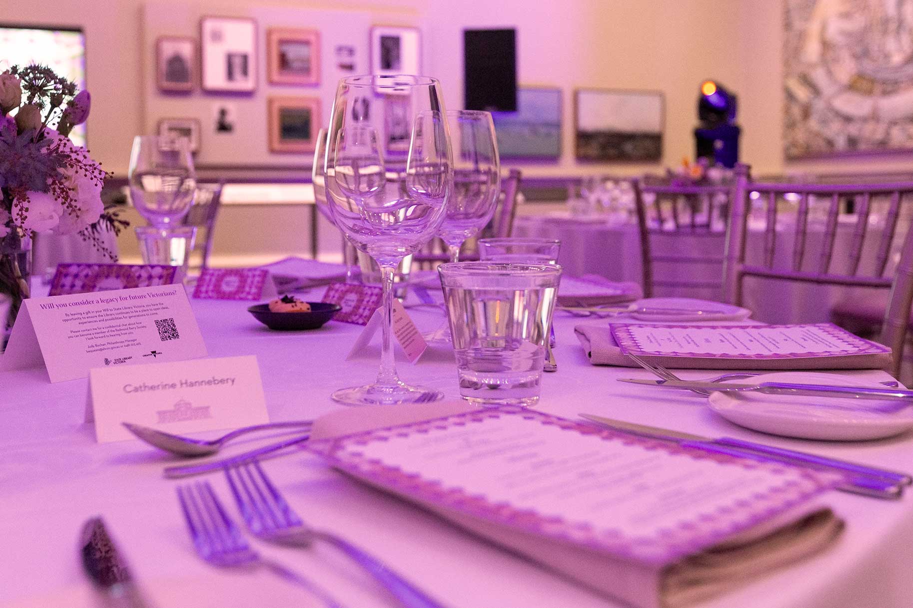 Redmond Barry Society event at State Library Victoria - dinner setting, a menu is shown in the foreground on a table setting
